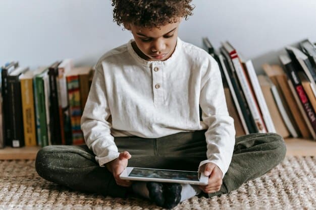 A person browsing a tablet with the We Need Diverse Books website displayed on the screen, showcasing various book covers and articles related to diverse literature.