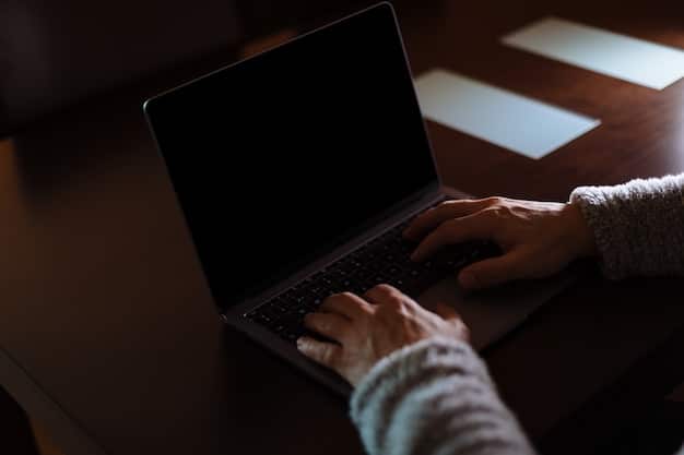 A close-up of the author's hands typing furiously on a laptop, illuminated by the screen's glow in a dimly lit room. This captures the dedication, late nights, and hard work behind the scenes.
