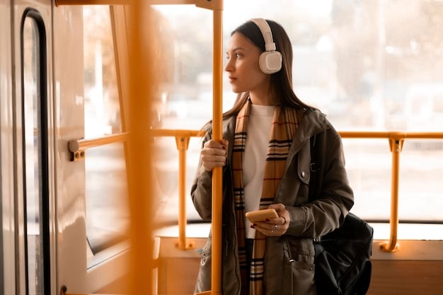 A person listening to an audiobook on noise-canceling headphones while commuting on a futuristic train, showcasing the blend of technology and storytelling.