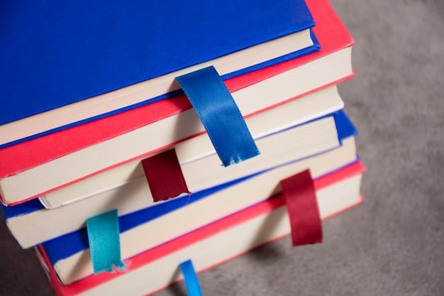 A close-up shot of several diverse book covers stacked on top of each other, showcasing a variety of genres like science fiction, historical fiction, graphic novel, and poetry, each with vibrant and intriguing cover art.