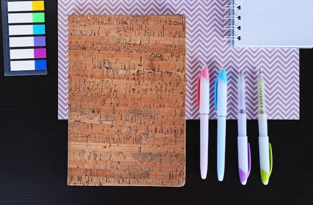 A close-up shot of a notebook filled with handwritten notes and sticky notes. A pen is resting on the notebook, and a partially read book is visible in the background. The scene suggests active engagement with the text.