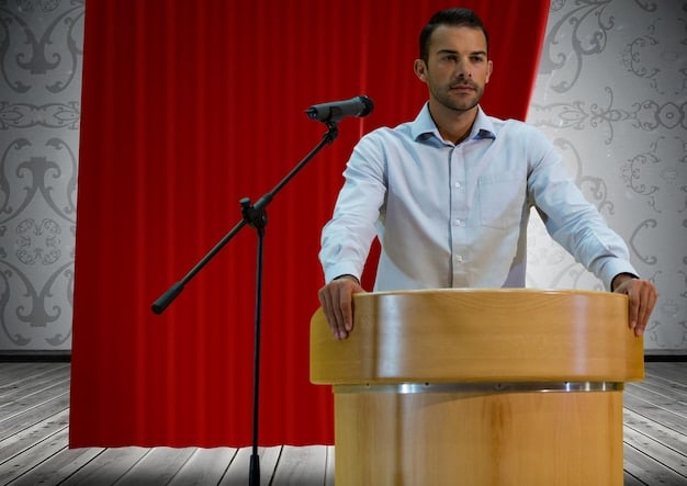 A wide shot of an author standing at a podium, giving a speech. The composition follows the rule of thirds, with the author positioned on the left third of the frame and the audience occupying the remaining space. The background is a simple, uncluttered wall.