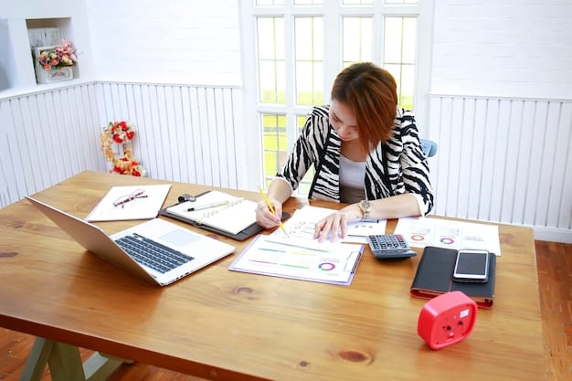 A photo depicting a person carefully reviewing a budget spreadsheet on a laptop, highlighting cost categories relevant to event planning, with pens and a calculator nearby.