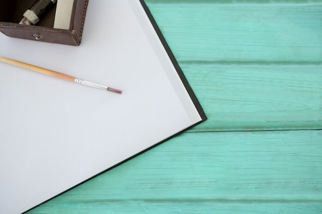 A close-up shot of a workbook page with space for note-taking during an author workshop. The workbook page contains prompts and questions tailored to the author's book topic, designed to encourage active participation and reflection from attendees. Pens and highlighters are scattered around, suggesting a session in progress.