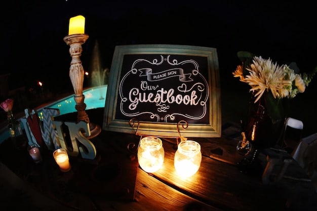 A shot of a beautifully decorated refreshment table at an author event, complete with a chalkboard sign indicating the menu and encouraging guests to help themselves.