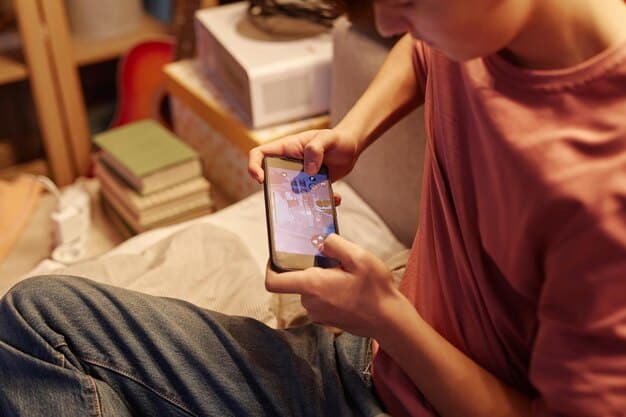 A close-up shot of a smartphone screen displaying a TikTok video of a person enthusiastically discussing a book, with shelves of books blurred in the background.