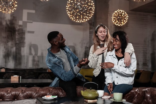 A diverse group of four individuals laughing around a table at a cafe, with open books and coffee cups, suggesting a comfortable and friendly book club atmosphere.