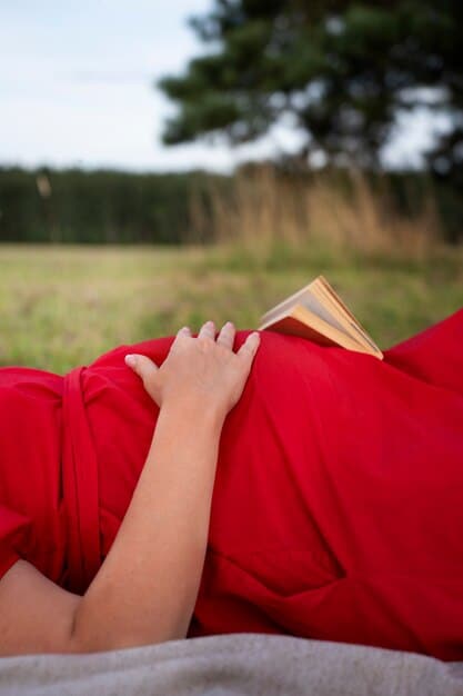 A person holding an open book with hands clasped around it, surrounded by a subtle, blurred background of a cozy reading nook, emphasizing the act of reading and contemplation.