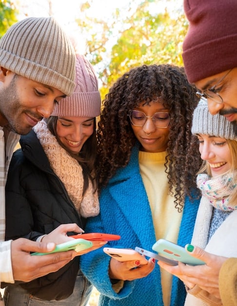 A diverse group of young readers on their smartphones, with a book in open hands, indicating a strong BookTok community vibe. They are all engaged and smiling.