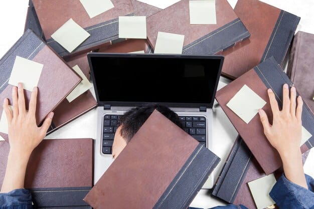 An author's hand typing on a laptop, surrounded by well-organized folders and digital mock-ups of book covers and press kits on the screen, illustrating the process of crafting an effective pitch.