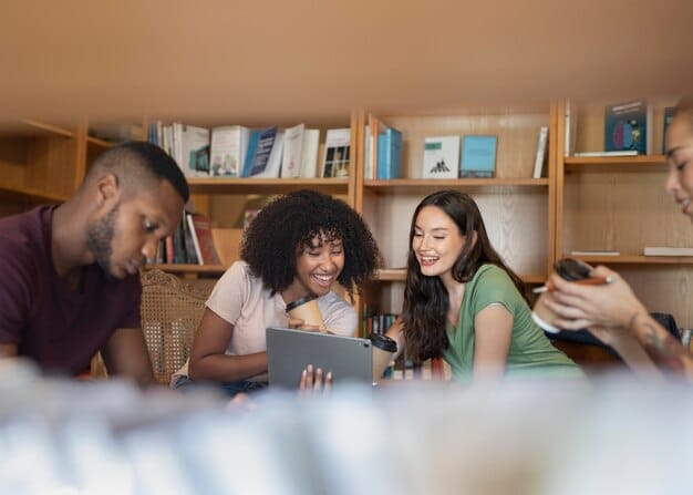 A diverse group of people engaged in a virtual book club meeting on a tablet screen, with various books visible on shelves in the background of their individual video feeds.