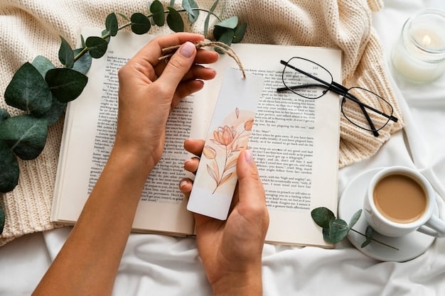 A person's hands holding a bookmark with text that says, 