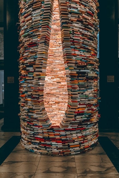A detailed, close-up shot of an open book with intricate illustrations and dense text, representing the depth and complexity characteristic of literary fiction.