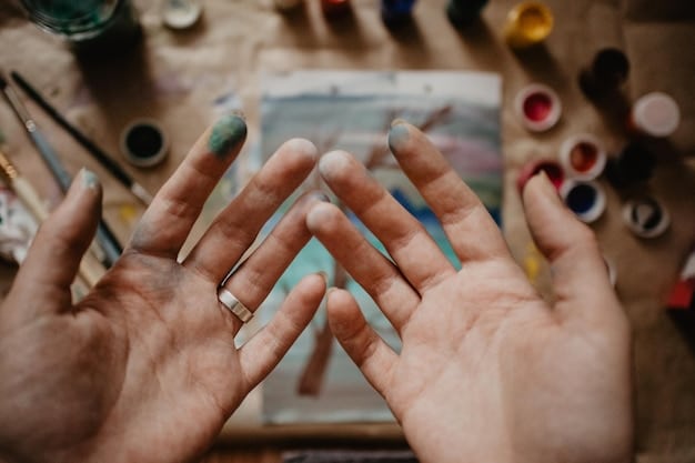 A close-up shot of hands working together on a collaborative art project inspired by a book, such as painting a mural or creating a collage with quotes and imagery from the text. This emphasizes the interactive and creative potential of book club activities Beyond the Book: 4 Creative Activities to Enhance Book Club Engagement.